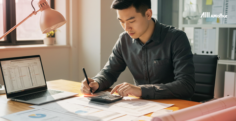 An aspiring boss calculating cost to find out how much does it cost to set up and open new office